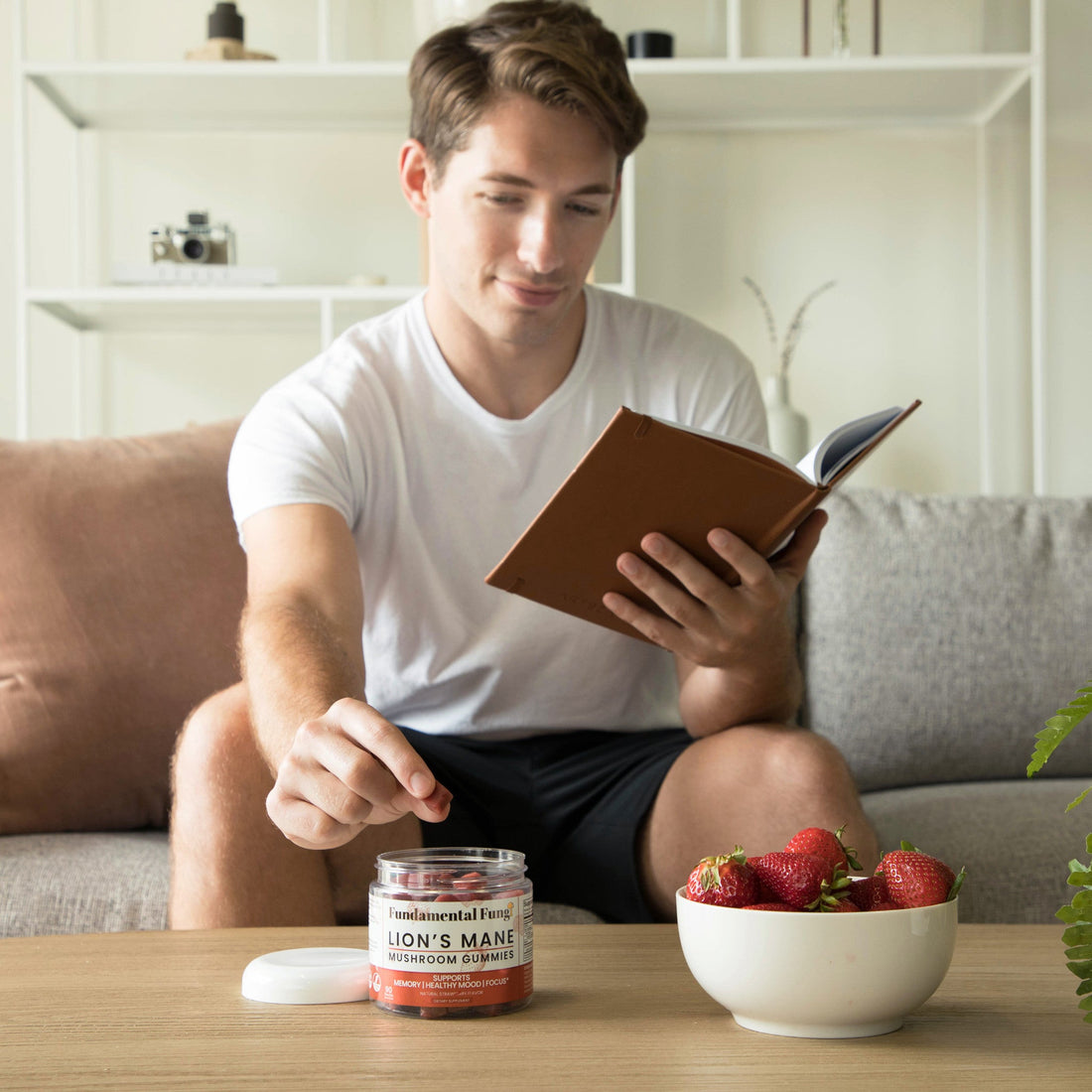 Morning routine with coffee, a book and Lion's Mane mushroom gummies